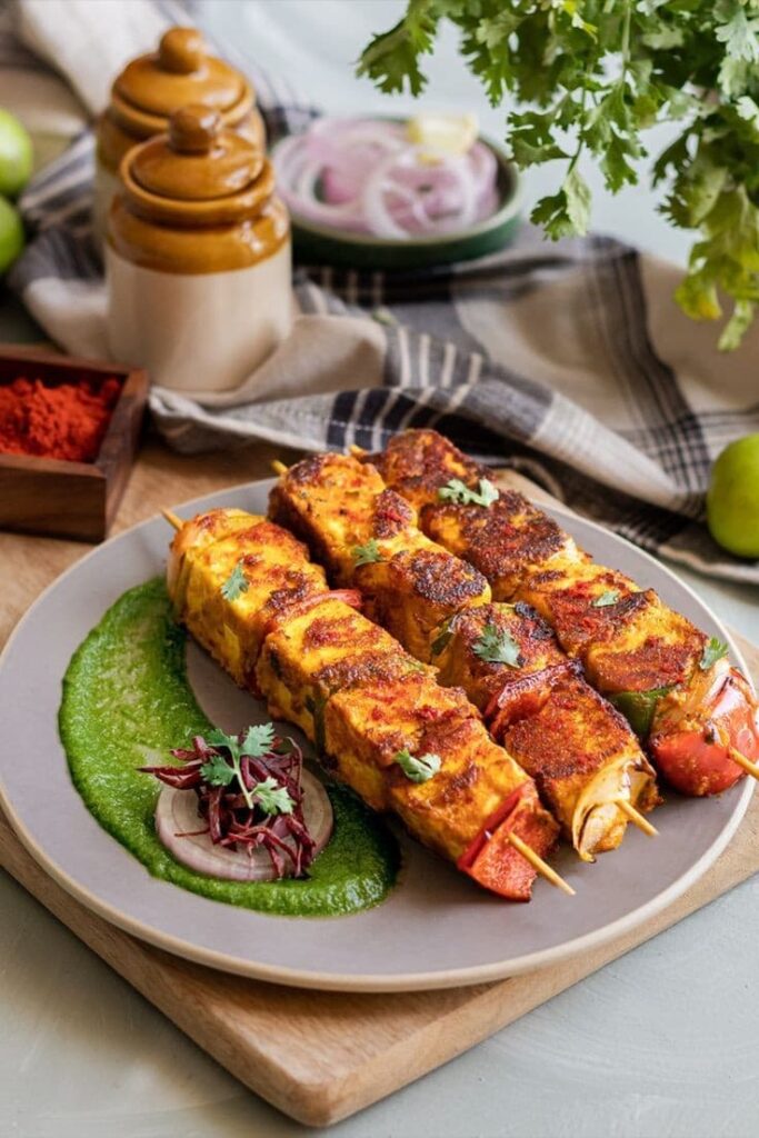 Spicy paneer tikka cubes charred and marinated in rich tandoori spices